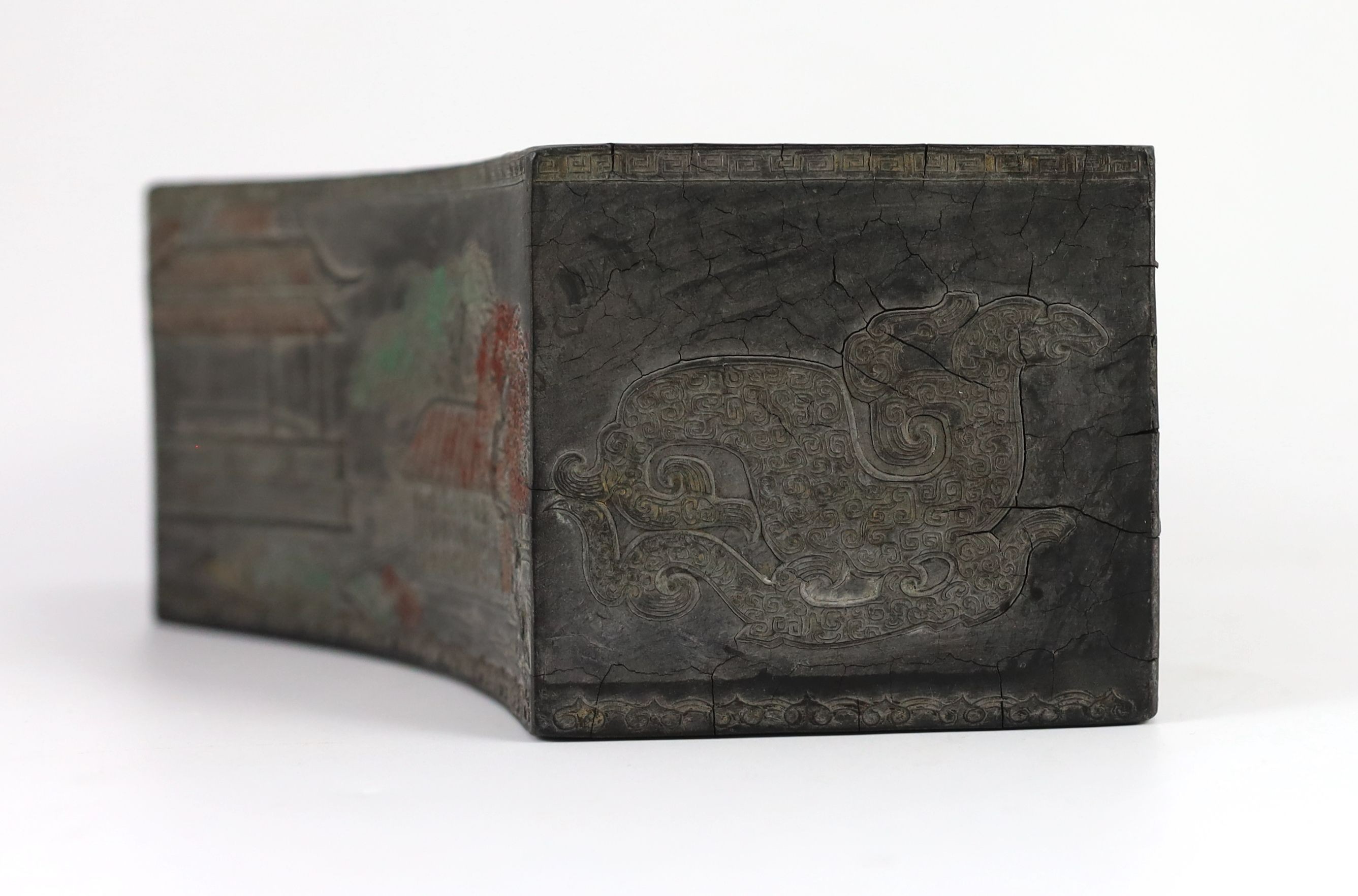 A Chinese compressed ink block in the form of a flower pot, Ming mark, Qing dynasty, 25 cm wide